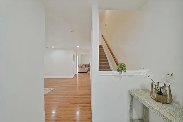 a view of entryway and kitchen