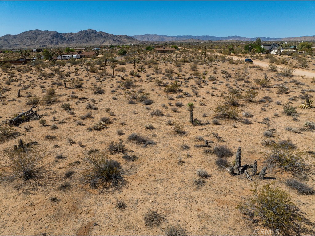 60119 Sunny Sands Drive Joshua Tree, CA 92252 - Photo 11 of 21 a view of lot of city and mountain