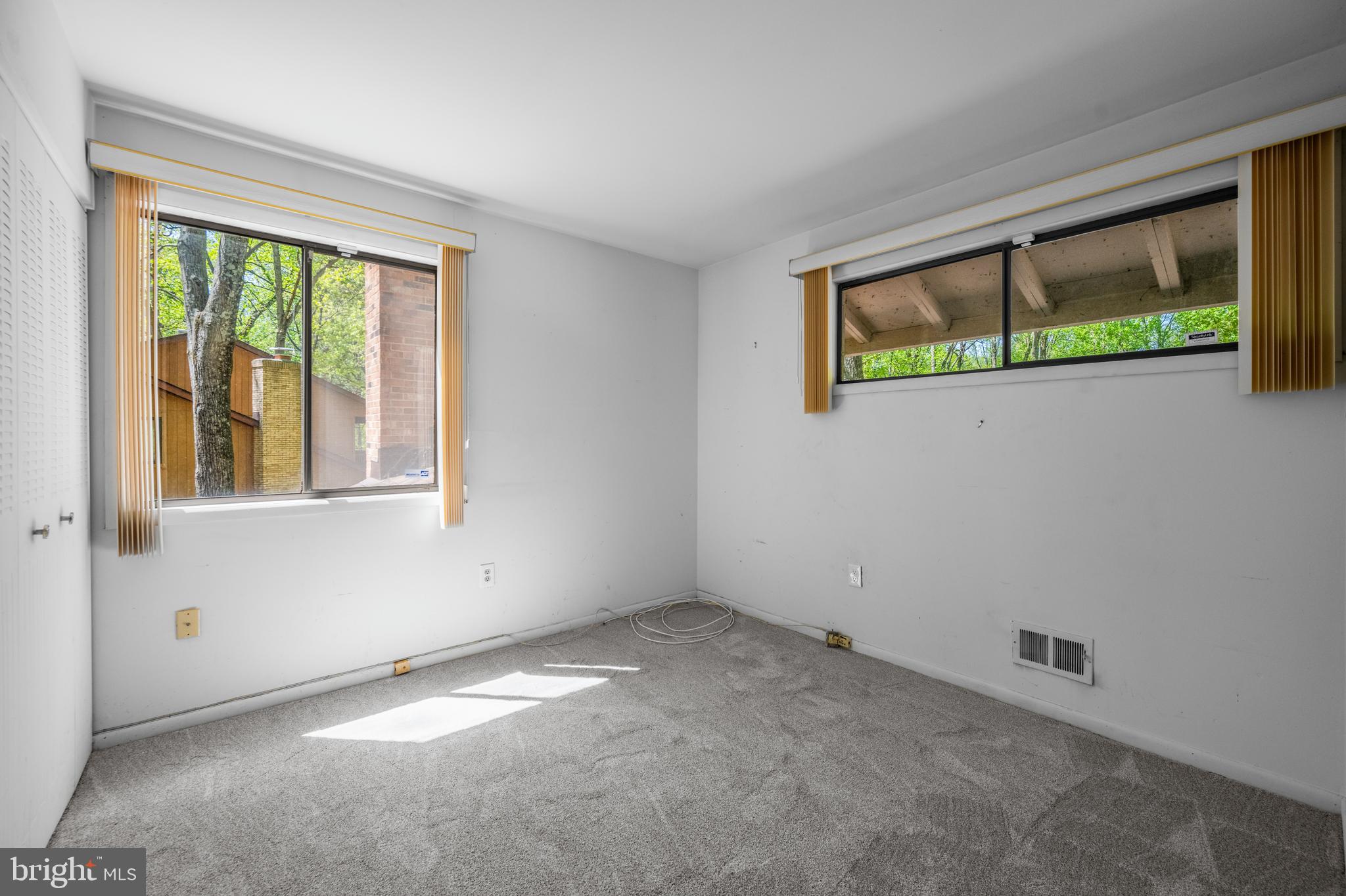11002 Swansfield Road Columbia, MD 21044 - Photo 15 of 23 an empty room with a window