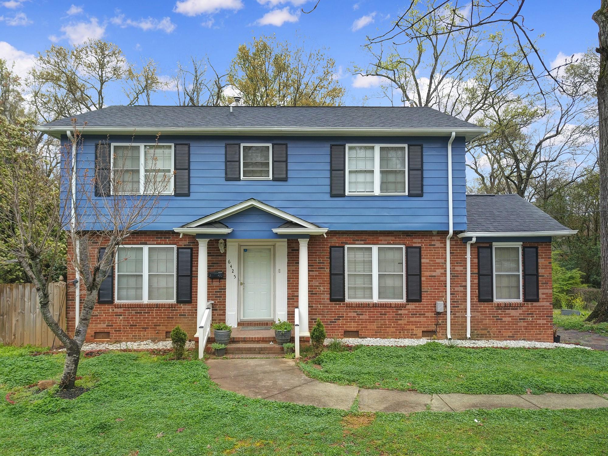 6425 Springfield Drive Charlotte, NC 28212 - Photo 1 of 37 front view of a house with a yard
