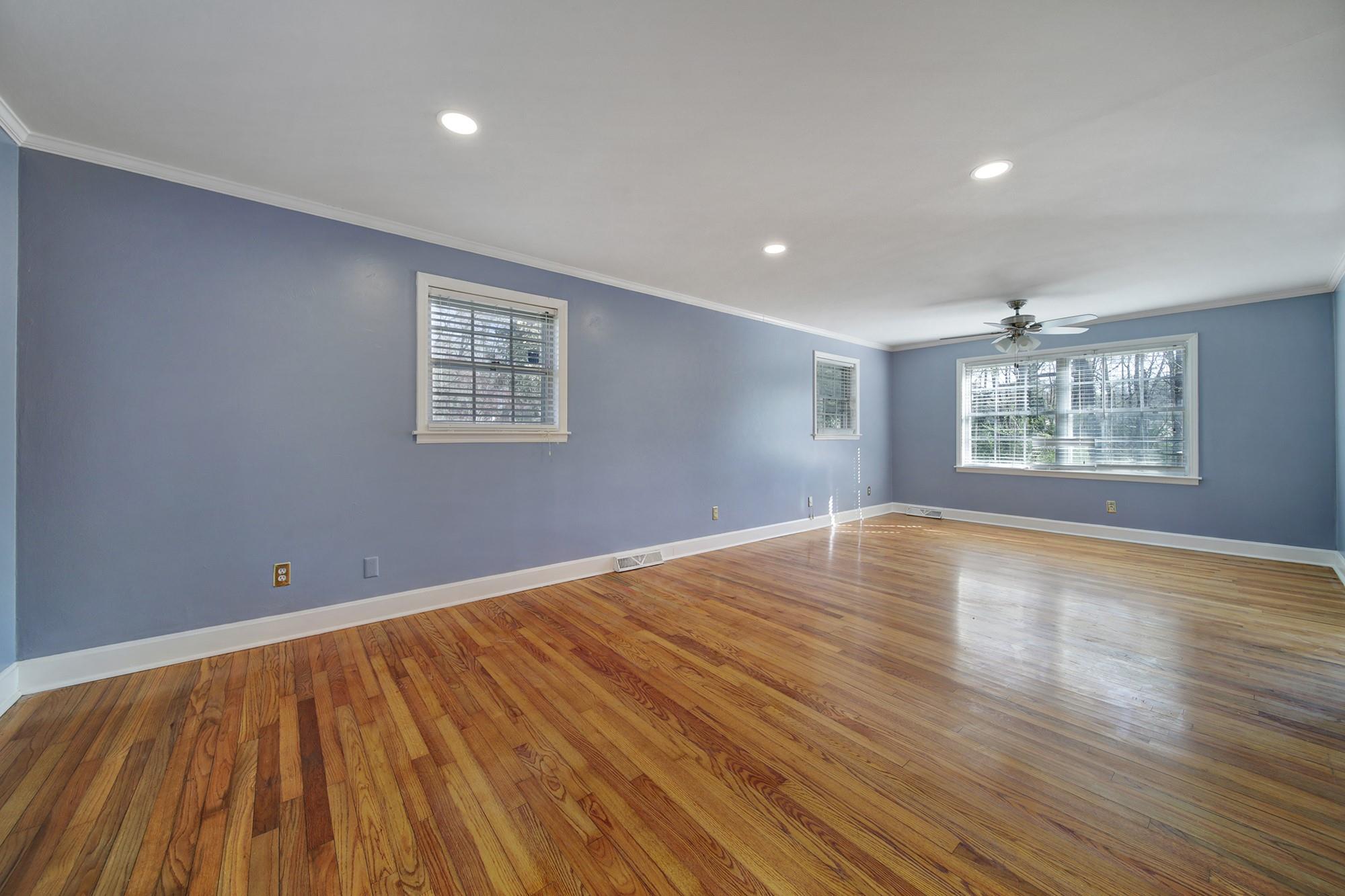6425 Springfield Drive Charlotte, NC 28212 - Photo 15 of 37 an empty room with wooden floor and windows