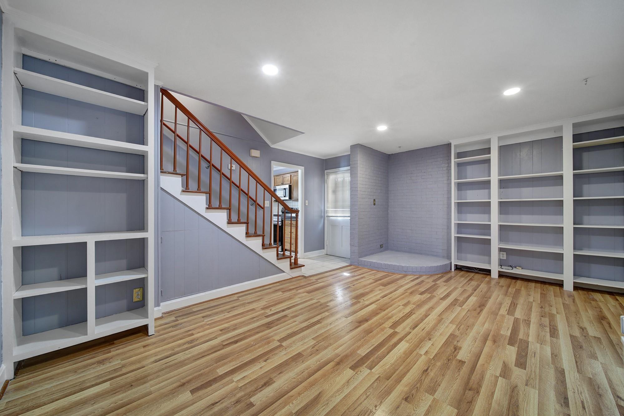6425 Springfield Drive Charlotte, NC 28212 - Photo 18 of 37 a view of an empty room with wooden floor and a window