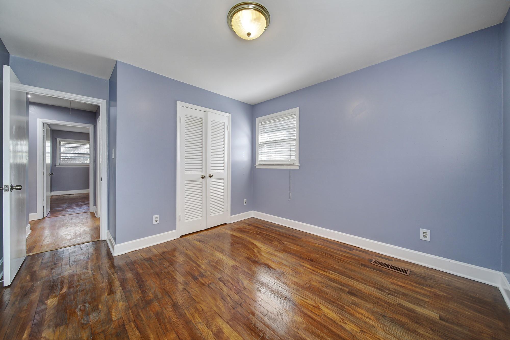 6425 Springfield Drive Charlotte, NC 28212 - Photo 27 of 37 a view of livingroom with hardwood floor and window