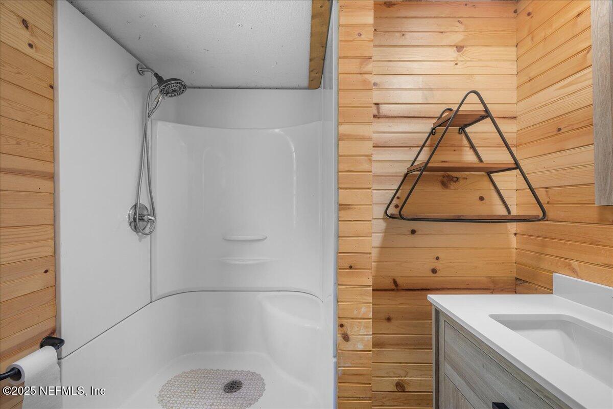 506 Cedar Creek Road, Unit 1 Palatka, FL 32177 - Photo 16 of 49 a bathroom with a sink and mirror