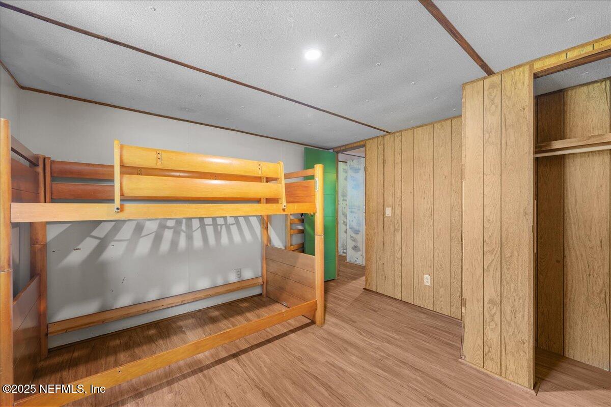 506 Cedar Creek Road, Unit 1 Palatka, FL 32177 - Photo 18 of 49 a view of a room with wooden floor and windows