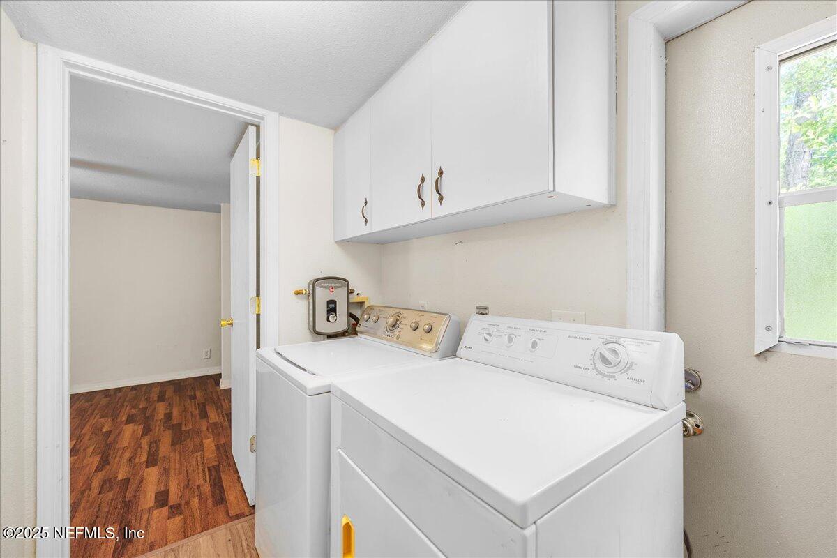 506 Cedar Creek Road, Unit 1 Palatka, FL 32177 - Photo 39 of 49 a utility room with dryer and washer