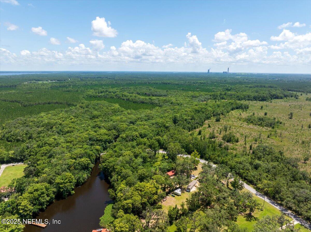 506 Cedar Creek Road, Unit 1 Palatka, FL 32177 - Photo 44 of 49 a view of a lake with green space