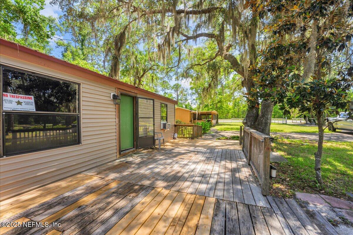 506 Cedar Creek Road, Unit 1 Palatka, FL 32177 - Photo 10 of 49 a view of a back yard with green space