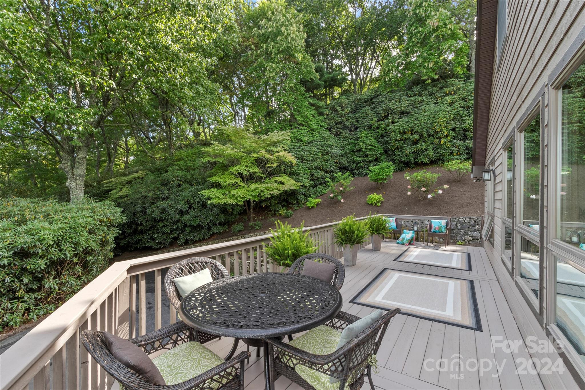 30 Pinkerton Corner Fairview, NC 28730 - Photo 12 of 31 a view of balcony with wooden floor and outdoor seating
