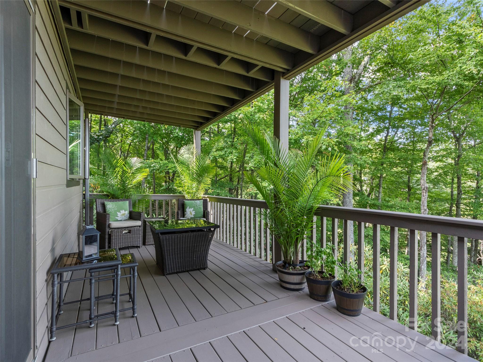 30 Pinkerton Corner Fairview, NC 28730 - Photo 21 of 31 a view of balcony with wooden floor and outdoor seating