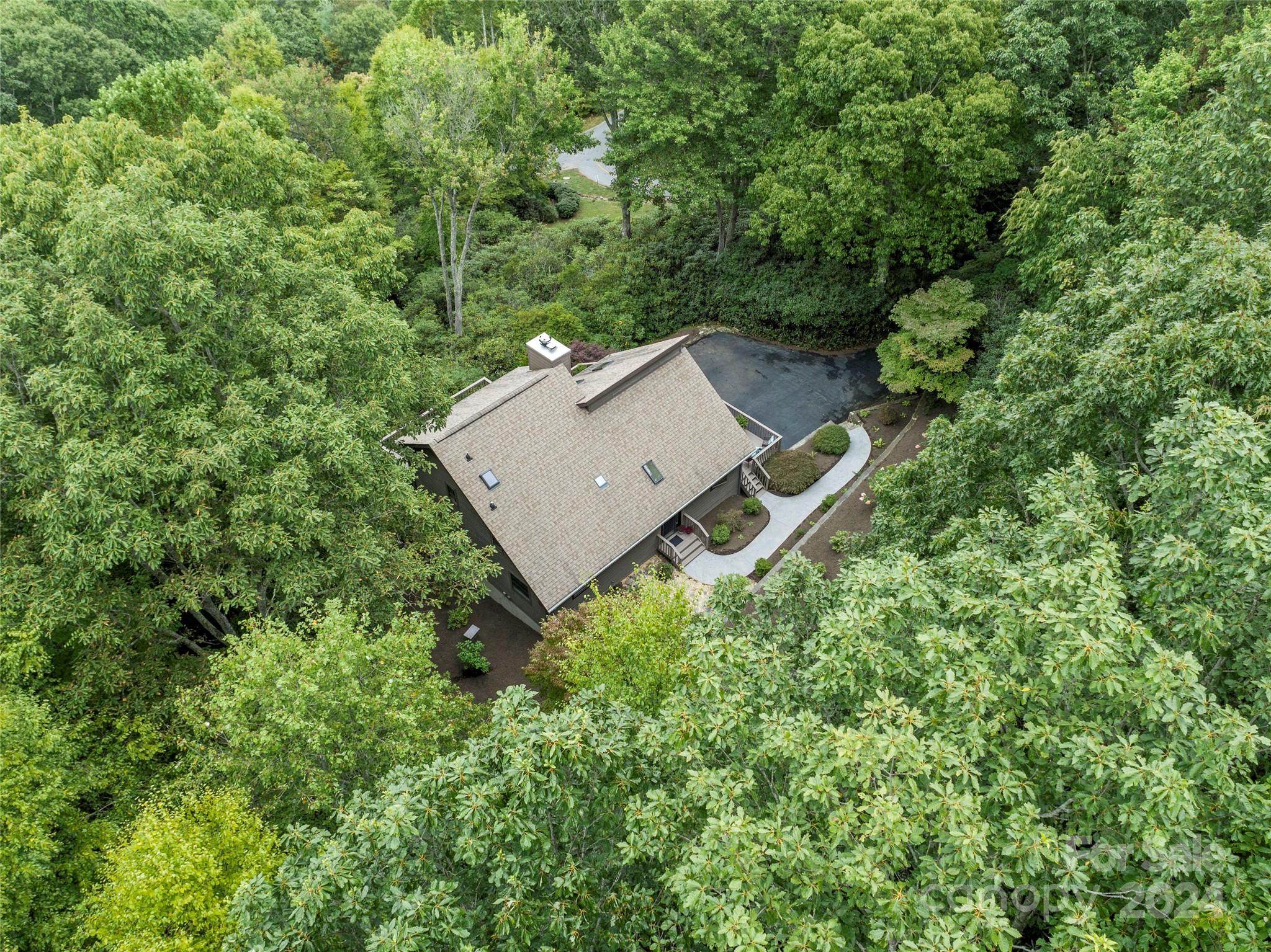 30 Pinkerton Corner Fairview, NC 28730 - Photo 25 of 31 an aerial view of a house with a yard