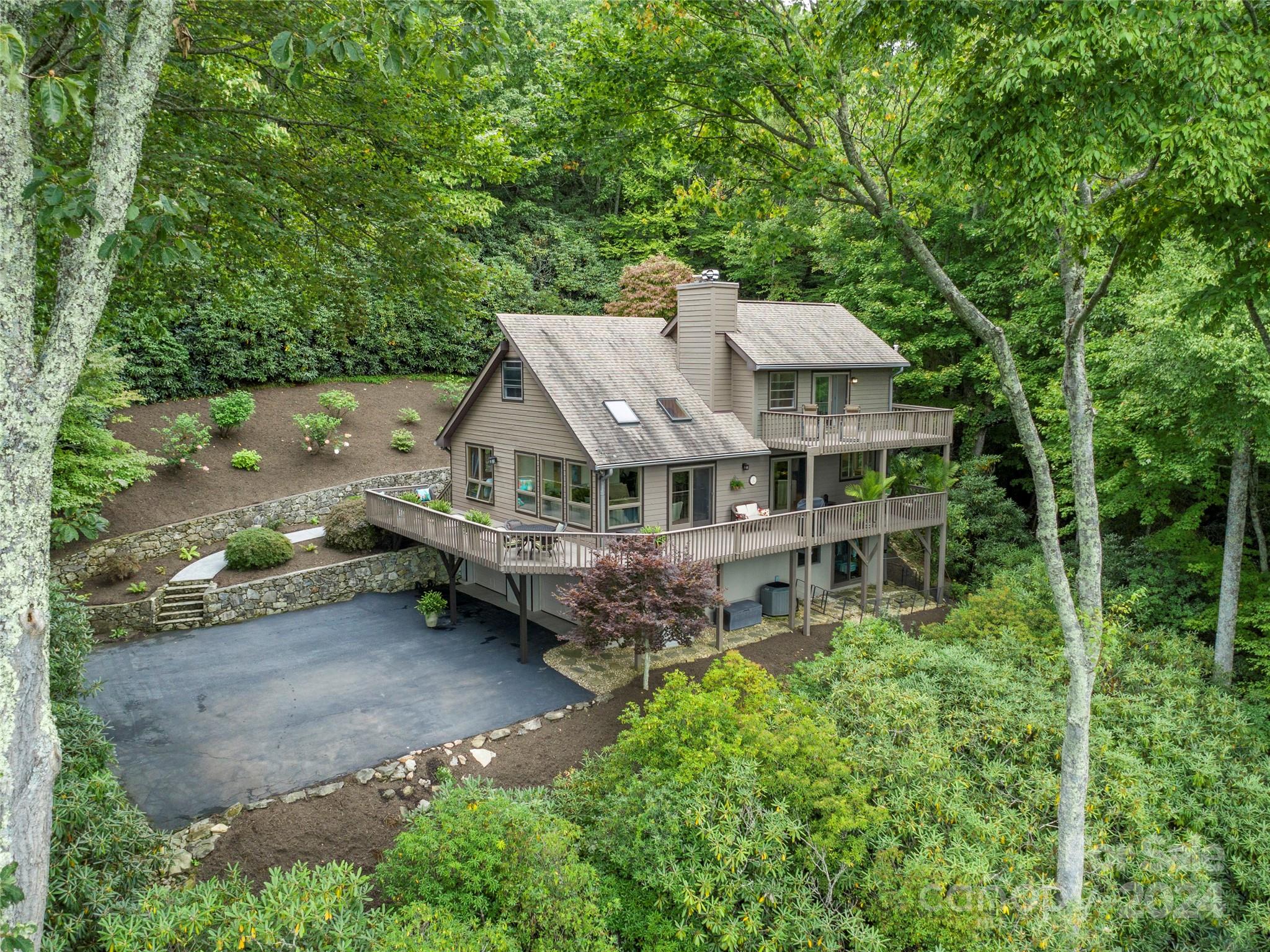 30 Pinkerton Corner Fairview, NC 28730 - Photo 3 of 31 an aerial view of a house with a big yard