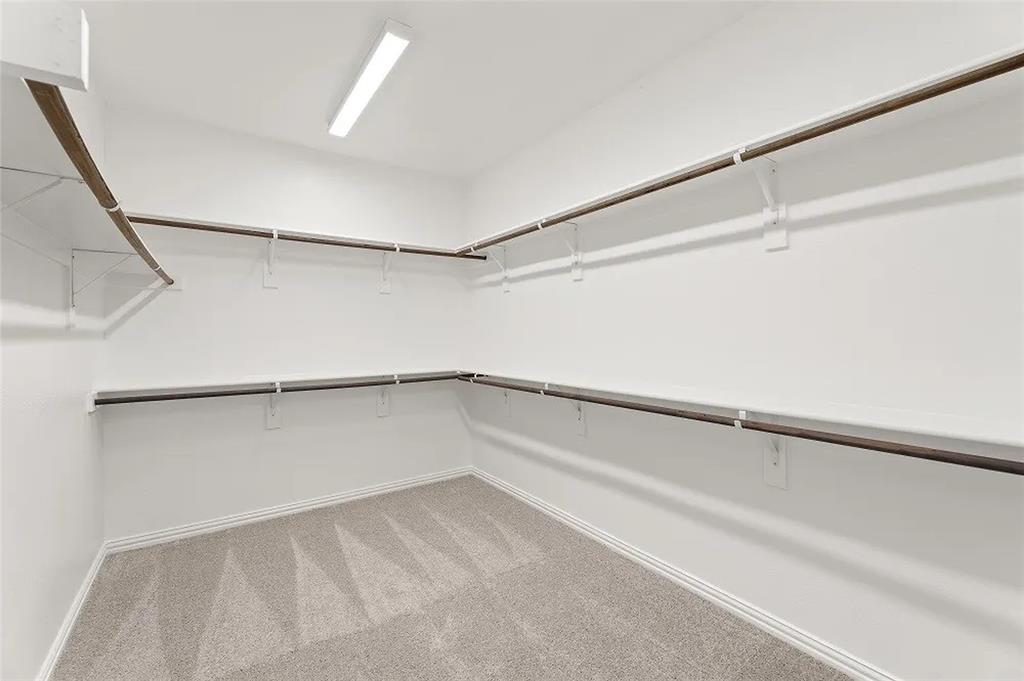 1632 Pavin Lane Fort Worth, TX 76052 - Photo 21 of 37 a view of an empty walk in closet