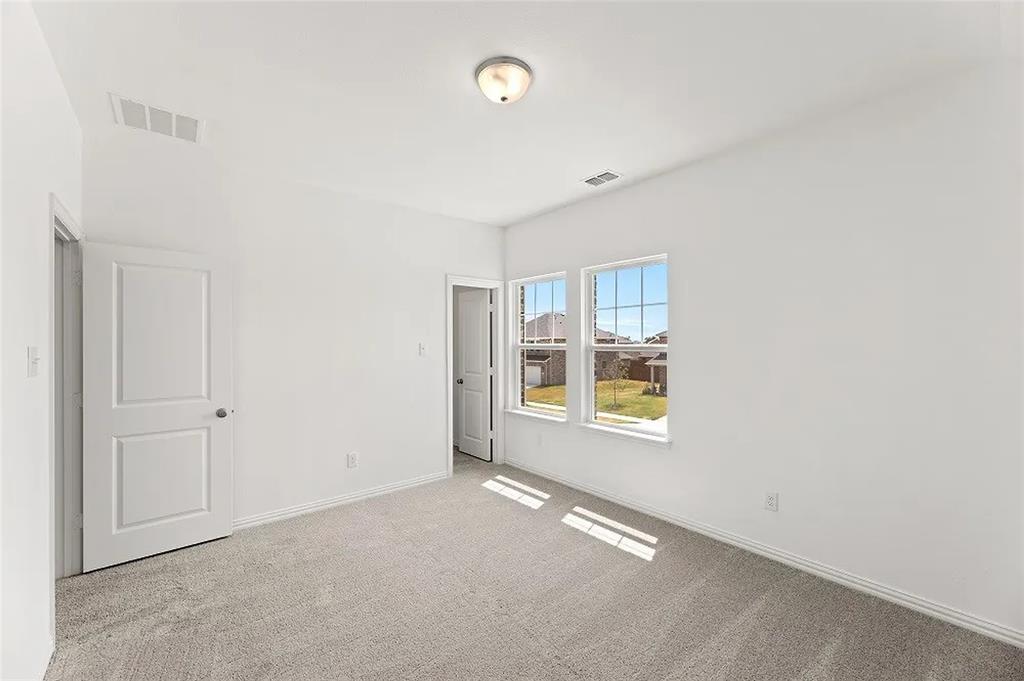 1632 Pavin Lane Fort Worth, TX 76052 - Photo 25 of 37 a view of an empty room with a window