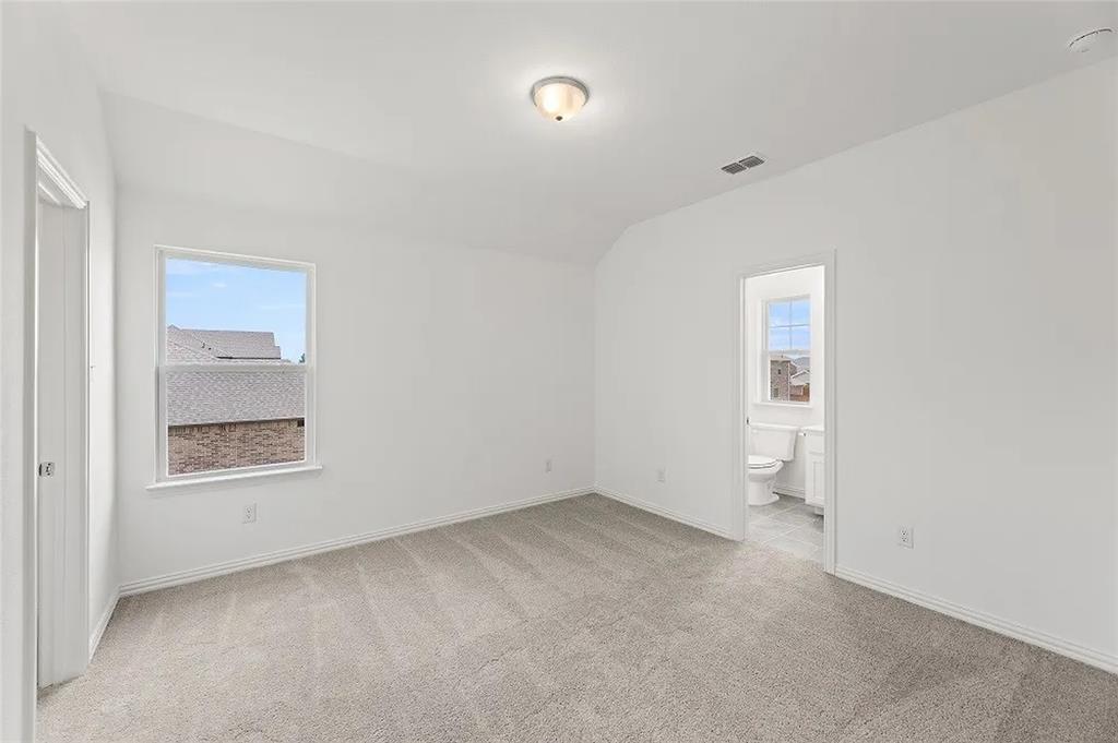 1632 Pavin Lane Fort Worth, TX 76052 - Photo 27 of 37 an empty room with a empty space and windows