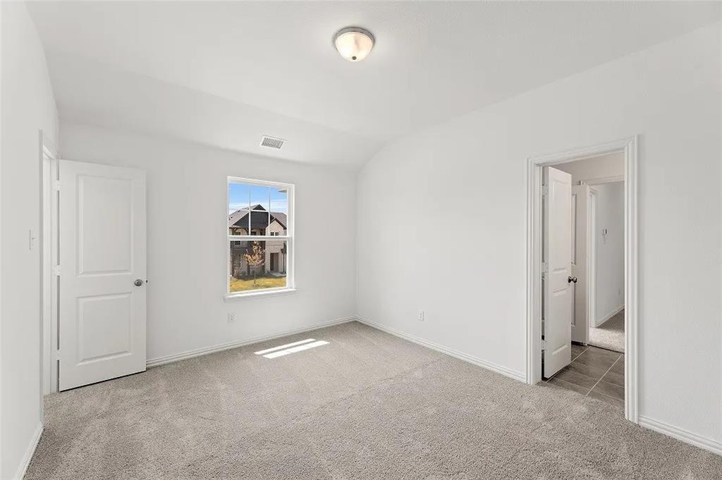 1632 Pavin Lane Fort Worth, TX 76052 - Photo 28 of 37 a view of an empty room with a window
