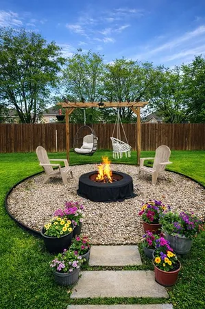 a view of a garden with a table and a chair