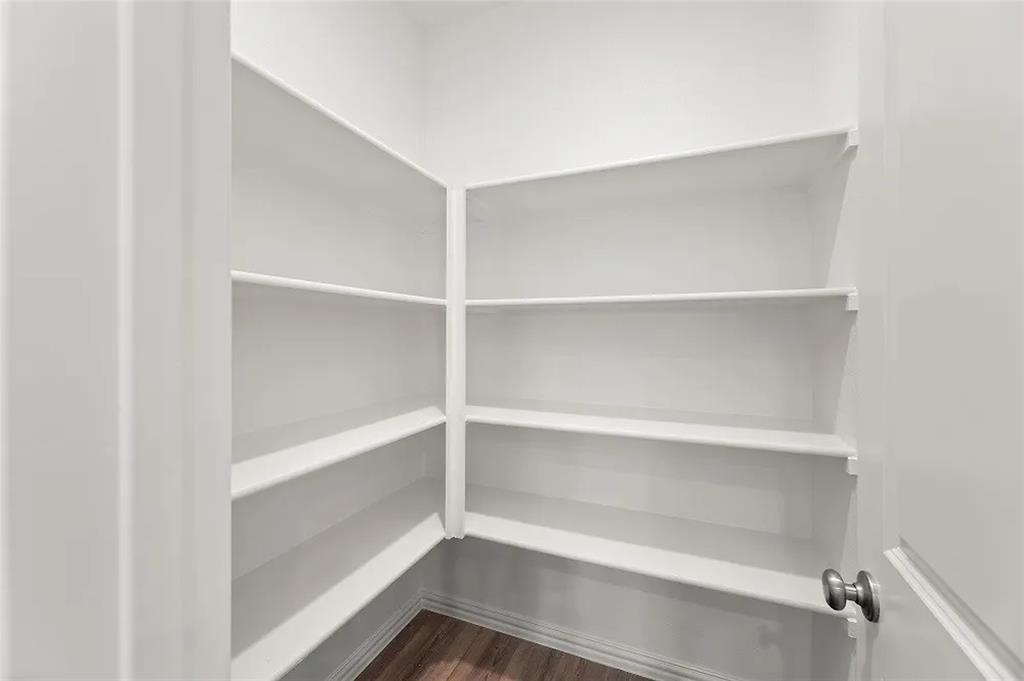 1632 Pavin Lane Fort Worth, TX 76052 - Photo 10 of 37 a view of walk in closet with empty racks
