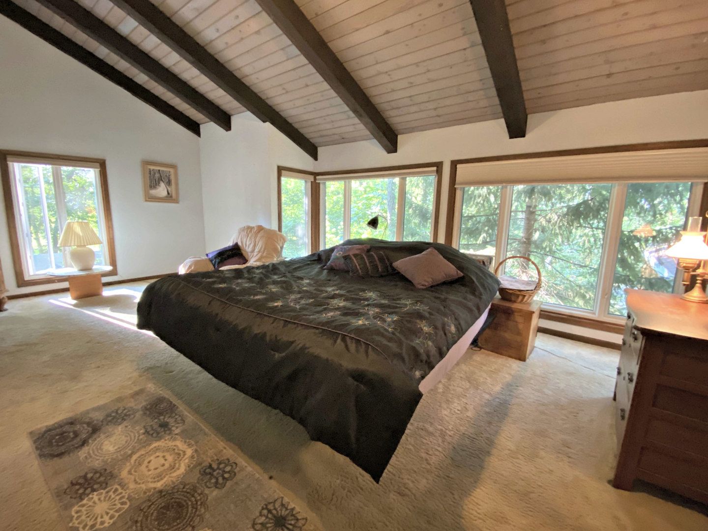 17301 O'Brien Road Harvard, IL 60033 - Photo 20 of 33 a bed sitting in a bedroom next to a large window