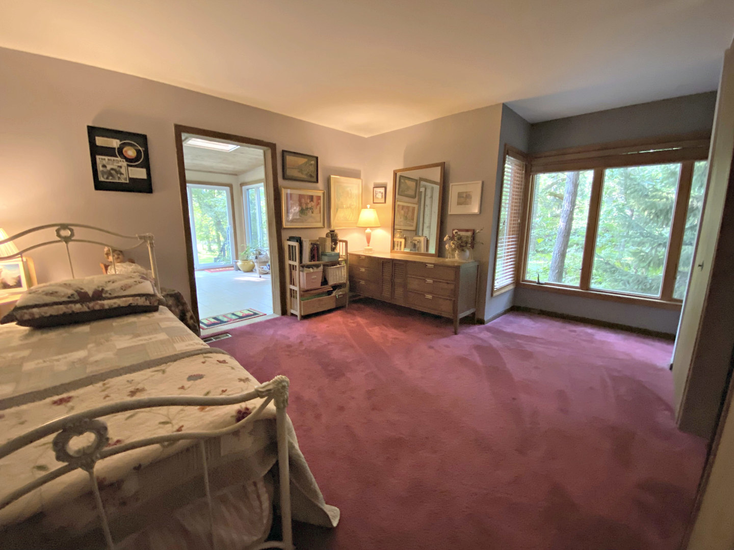 17301 O'Brien Road Harvard, IL 60033 - Photo 22 of 33 a bedroom with a bed and large windows