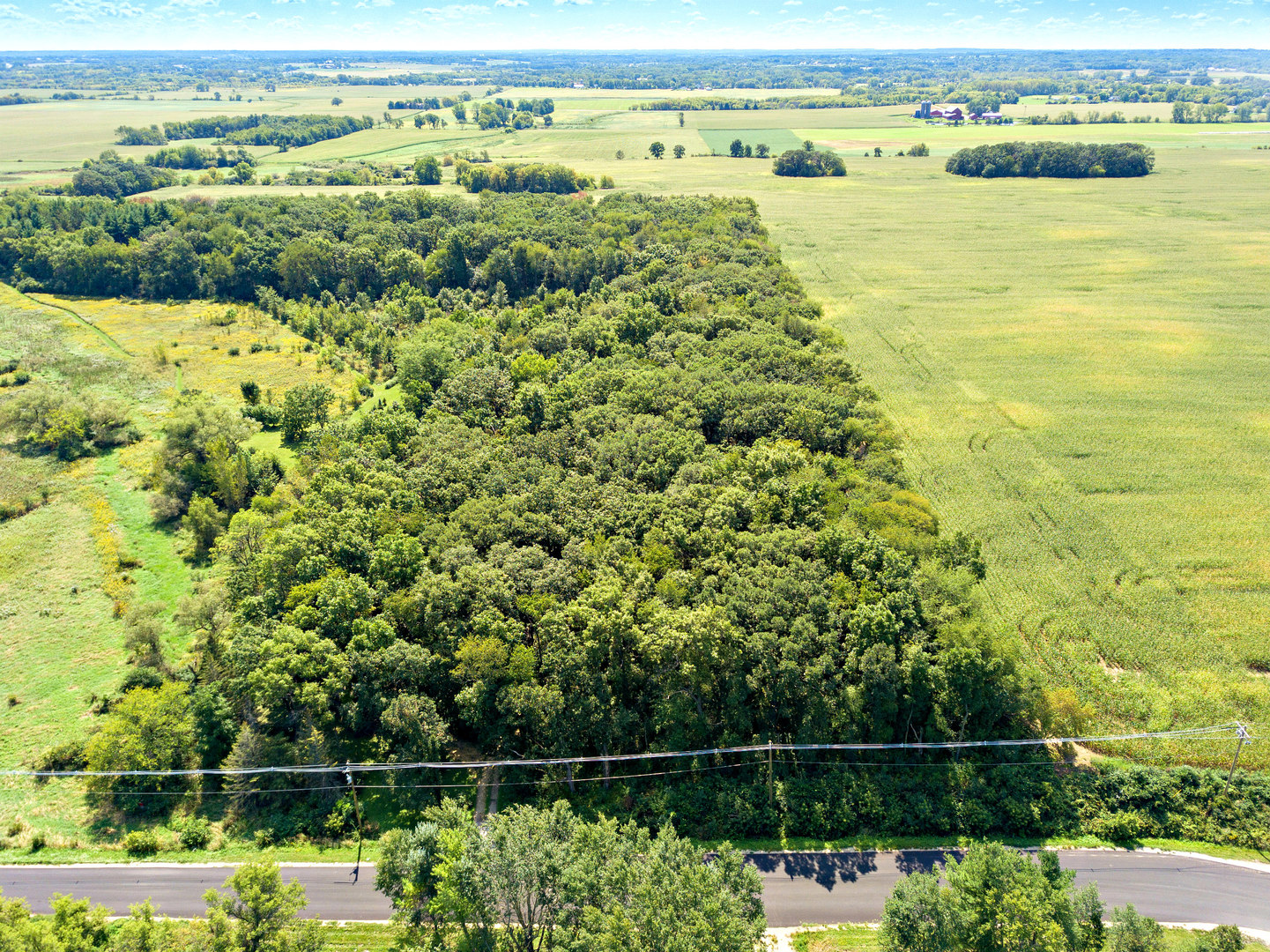 17301 O'Brien Road Harvard, IL 60033 - Photo 32 of 33 a view of a lake with a city view