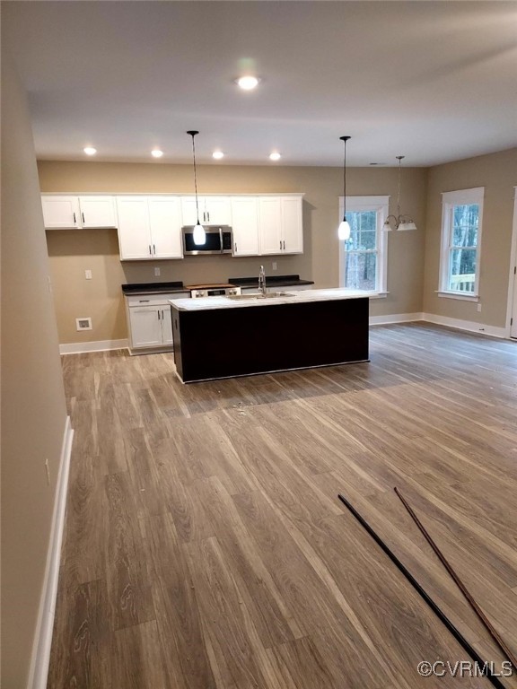 14271 Stage Road Lanexa, VA 23089 - Photo 2 of 14 Kitchen with white cabinetry, pendant lighting, an