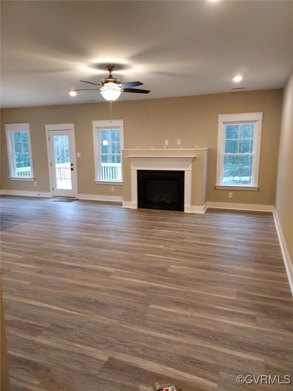 14271 Stage Road Lanexa, VA 23089 - Photo 3 of 14 Unfurnished living room with dark hardwood / wood-