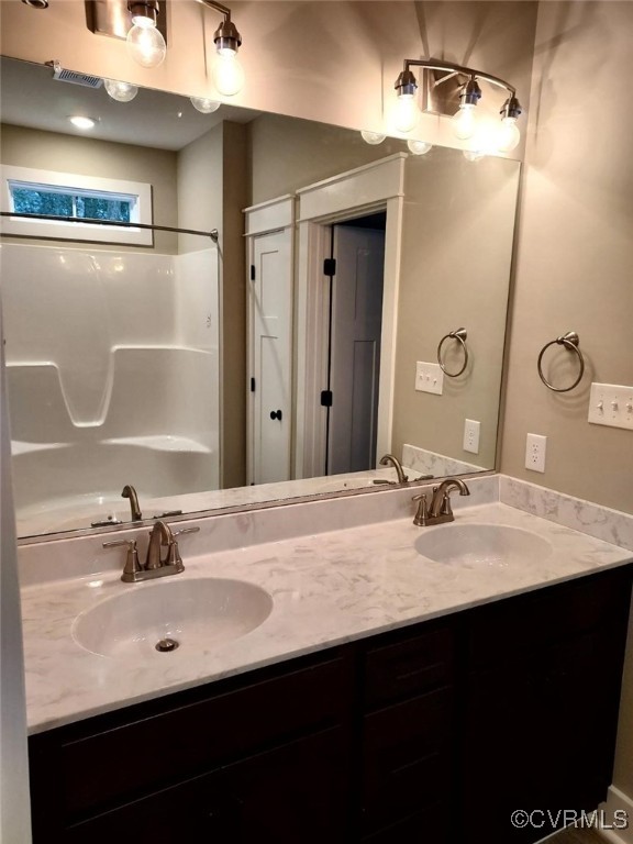 14271 Stage Road Lanexa, VA 23089 - Photo 4 of 14 Bathroom with vanity and walk in shower