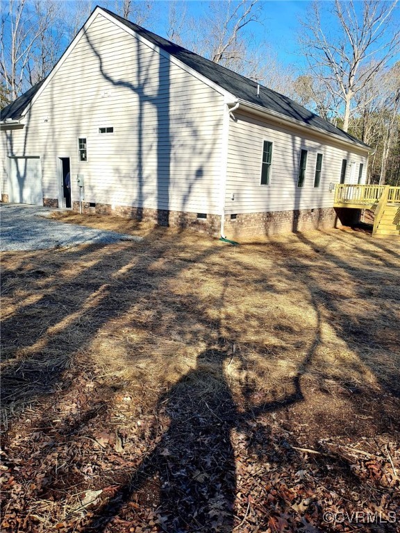 14271 Stage Road Lanexa, VA 23089 - Photo 9 of 14 Rear view of house featuring a wooden deck