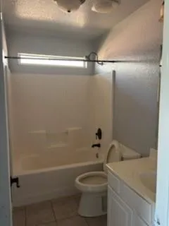 a bathroom with a sink and bathtub