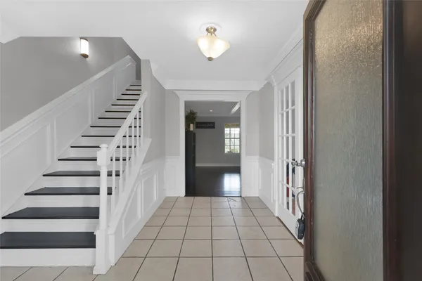 a view of a hallway view with staircase