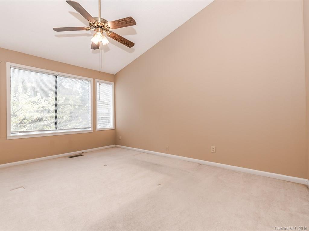 42 Old Post Road, Unit 42 Lake Wylie, SC 29710 - Photo 11 of 24 an empty room with a window and a fan