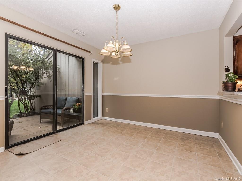 42 Old Post Road, Unit 42 Lake Wylie, SC 29710 - Photo 7 of 24 wooden floor in an empty room with a window