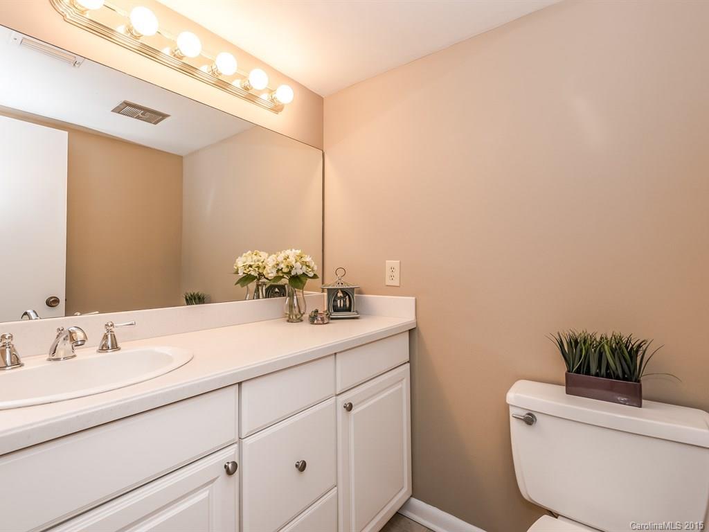 42 Old Post Road, Unit 42 Lake Wylie, SC 29710 - Photo 10 of 24 a bathroom with a toilet sink and mirror