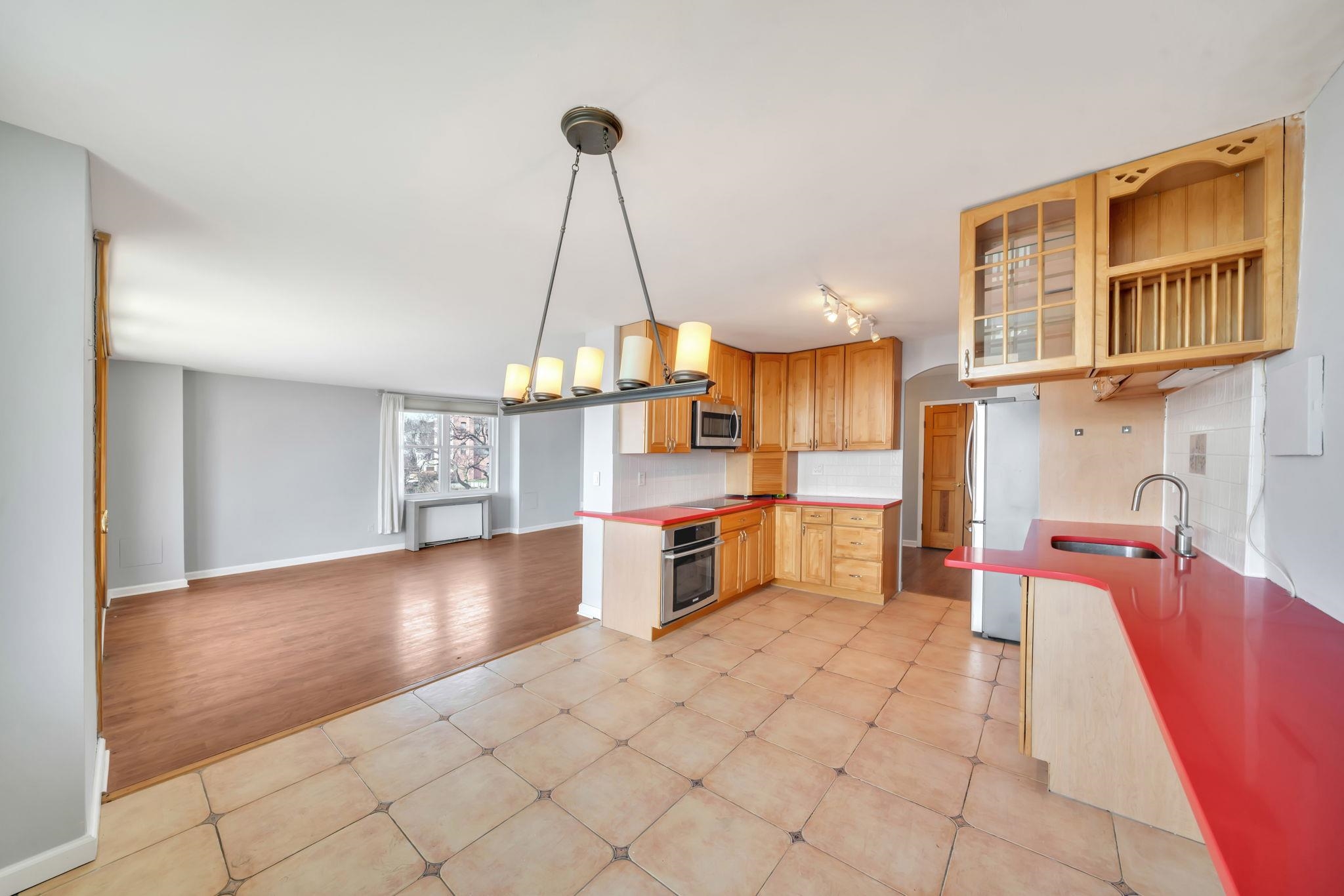 380 Mountain Road, Unit 213 Union City, NJ 07087 - Photo 14 of 36 a view of a kitchen with cabinets