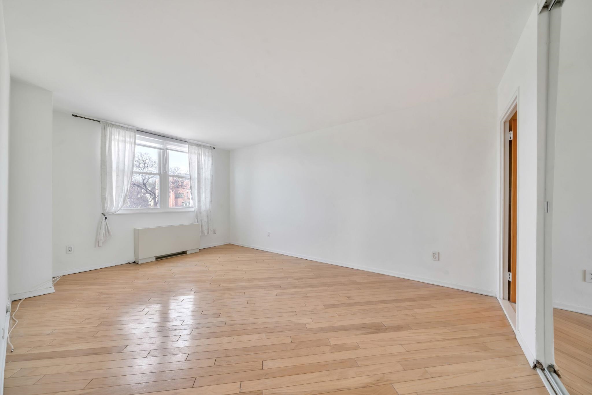 380 Mountain Road, Unit 213 Union City, NJ 07087 - Photo 23 of 36 a view of an empty room with a window