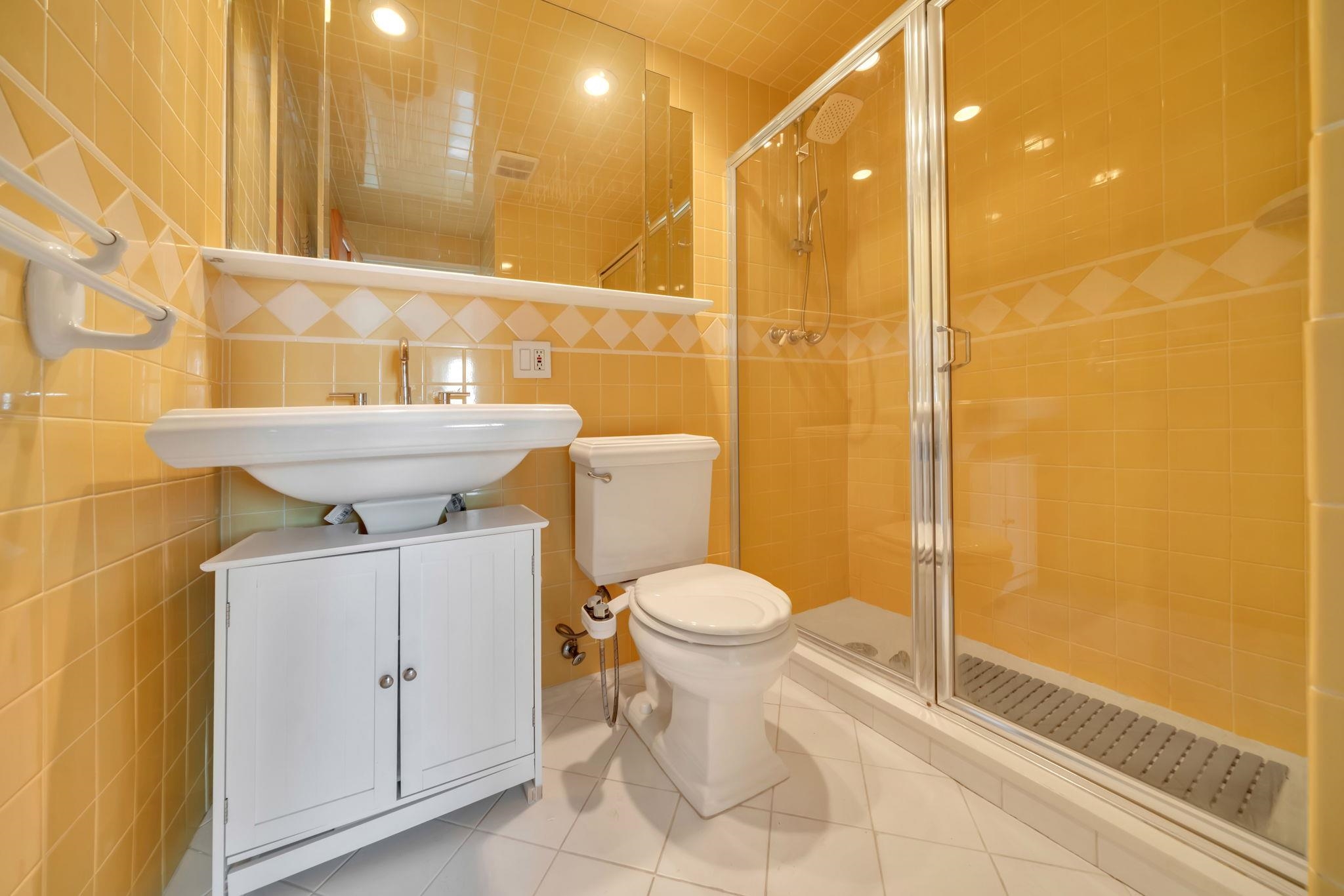 380 Mountain Road, Unit 213 Union City, NJ 07087 - Photo 28 of 36 a bathroom with a sink and a toilet