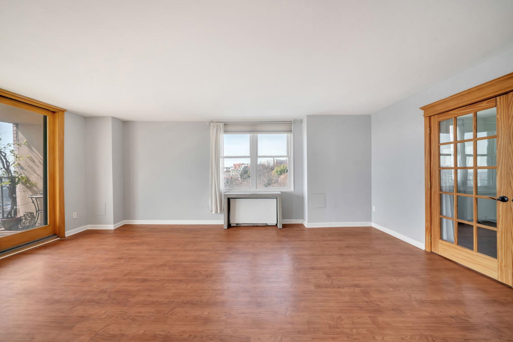 380 Mountain Road, Unit 213 Union City, NJ 07087 - Photo 7 of 36 a view of an empty room with a window