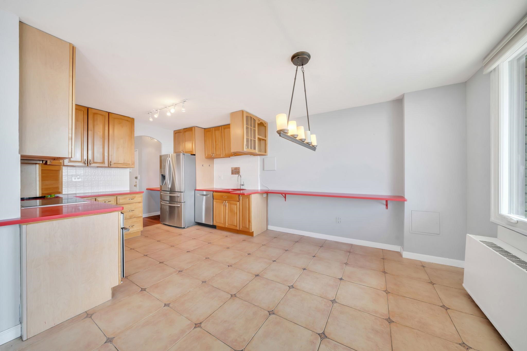 380 Mountain Road, Unit 213 Union City, NJ 07087 - Photo 8 of 36 a view of a kitchen with appliances