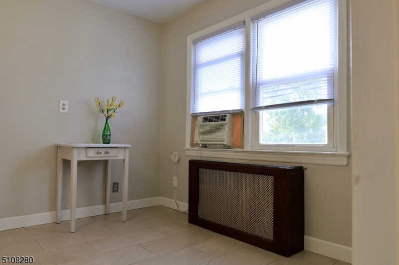 159 Prospect Street, Unit 2 Garfield, NJ 07026 - Photo 6 of 13 a kitchen with a sink and a window