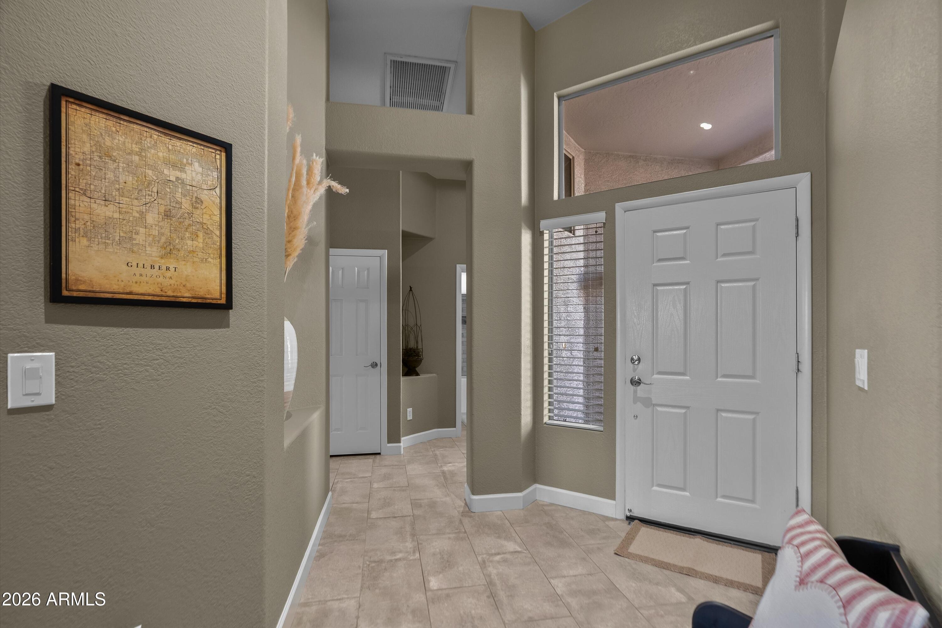 4685 East Walnut Road Gilbert, AZ 85298 - Photo 17 of 58 a view of a hallway with closet area