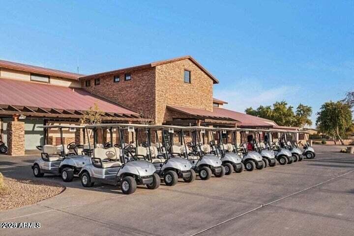 4685 East Walnut Road Gilbert, AZ 85298 - Photo 39 of 58 a view of a street with cars