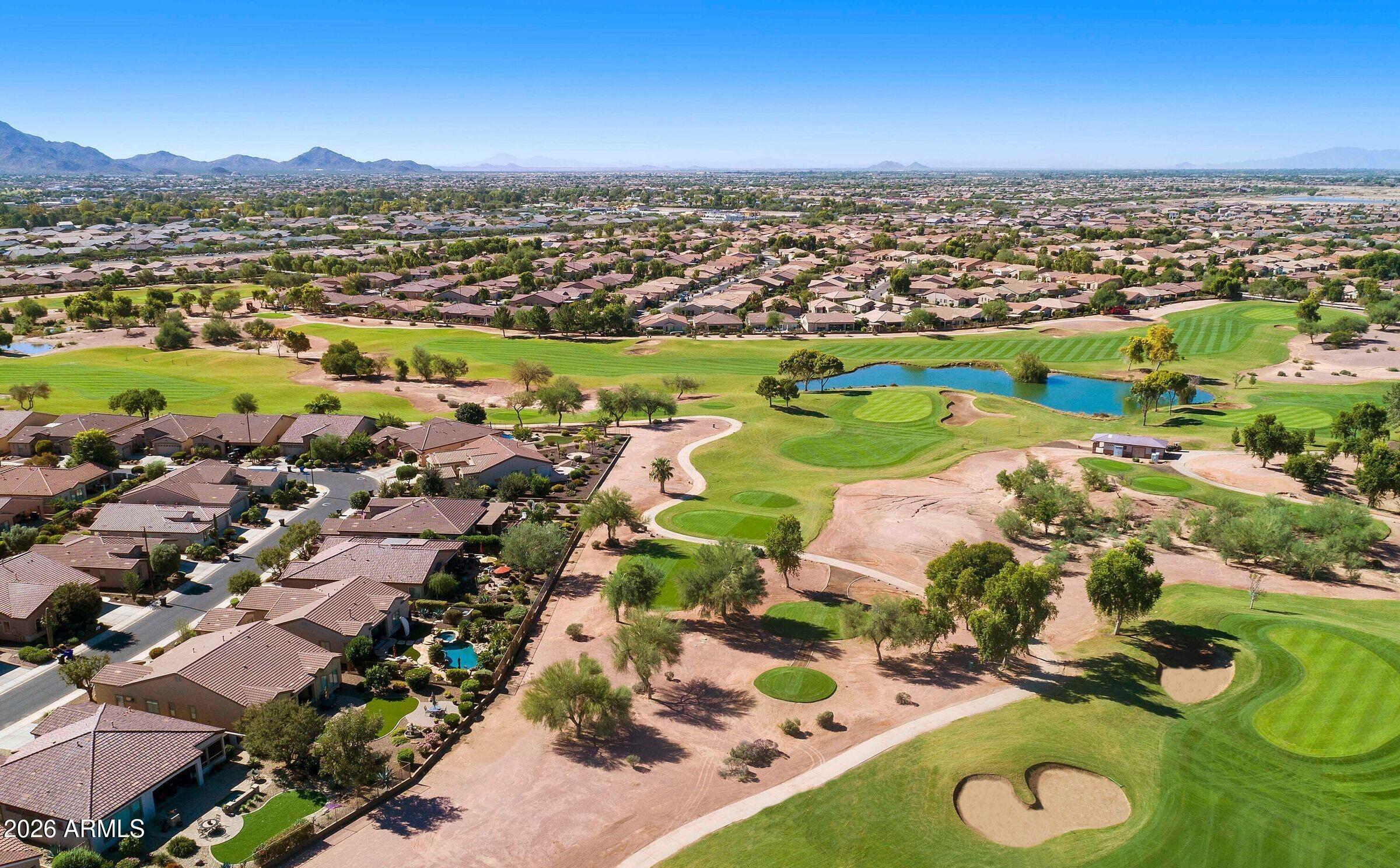 4685 East Walnut Road Gilbert, AZ 85298 - Photo 41 of 58 an aerial view of residential houses with outdoor space