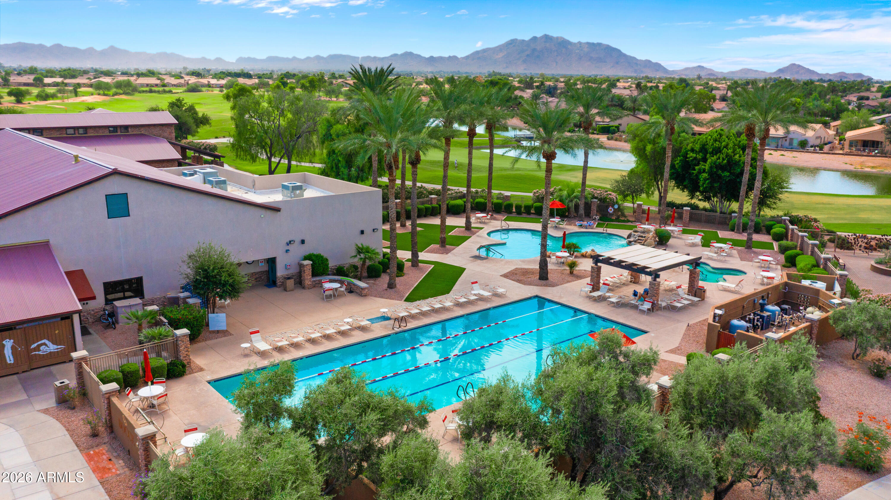 4685 East Walnut Road Gilbert, AZ 85298 - Photo 53 of 58 an aerial view of a house with a garden and lake view