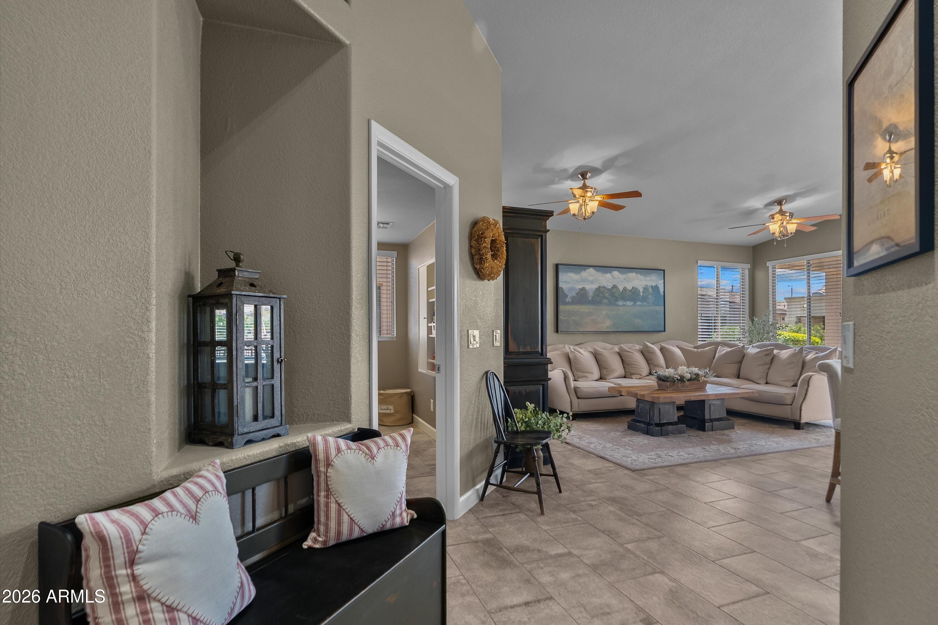 4685 East Walnut Road Gilbert, AZ 85298 - Photo 7 of 58 a living room with furniture