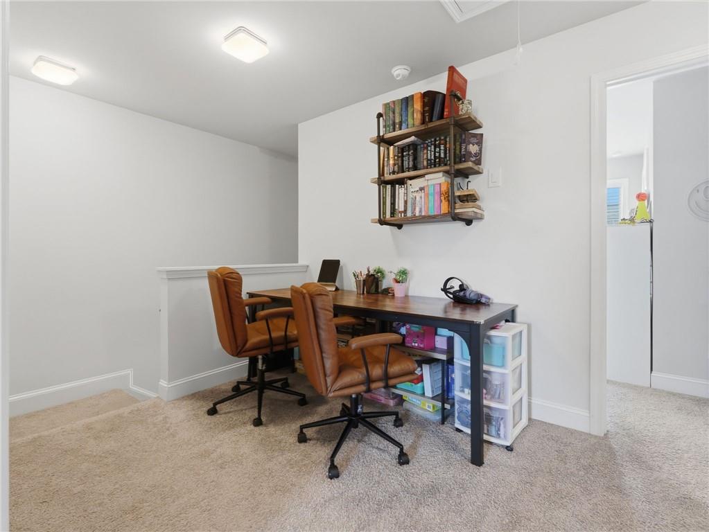147 Fieldbrook Crossing Canton, GA 30115 - Photo 31 of 46 a view of a workspace with furniture