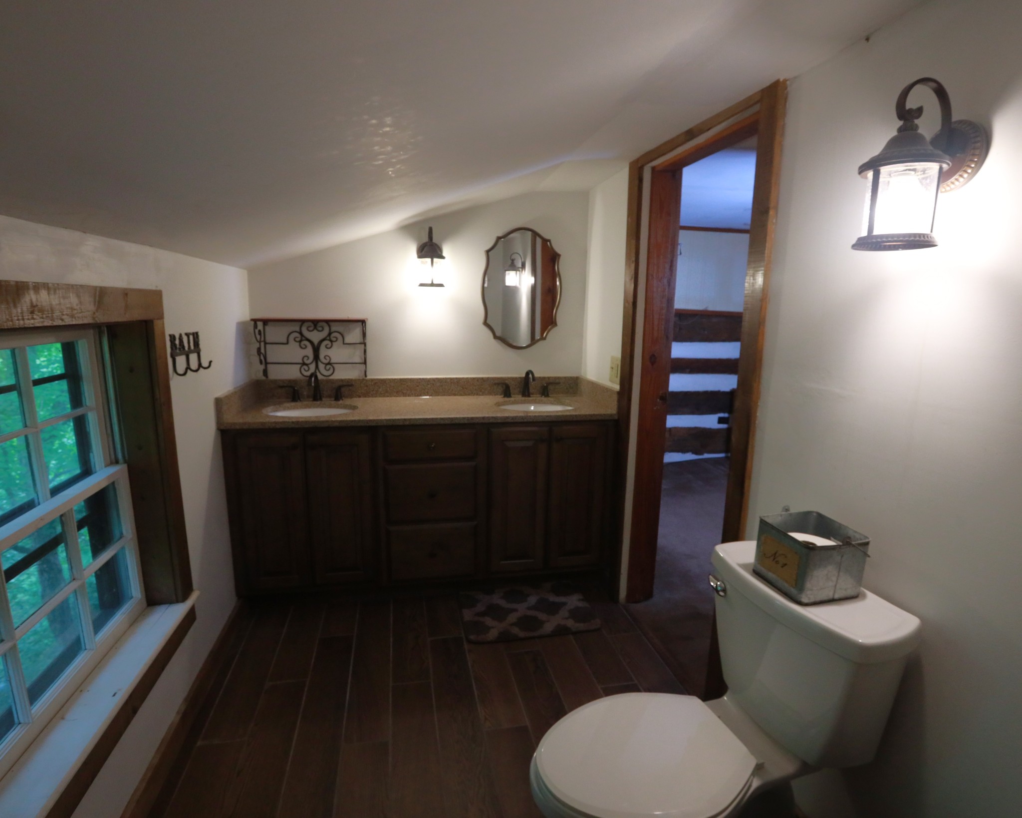 2634 Distillery Road Greenbrier, TN 37073 - Photo 23 of 35 a bathroom with a toilet sink and mirror