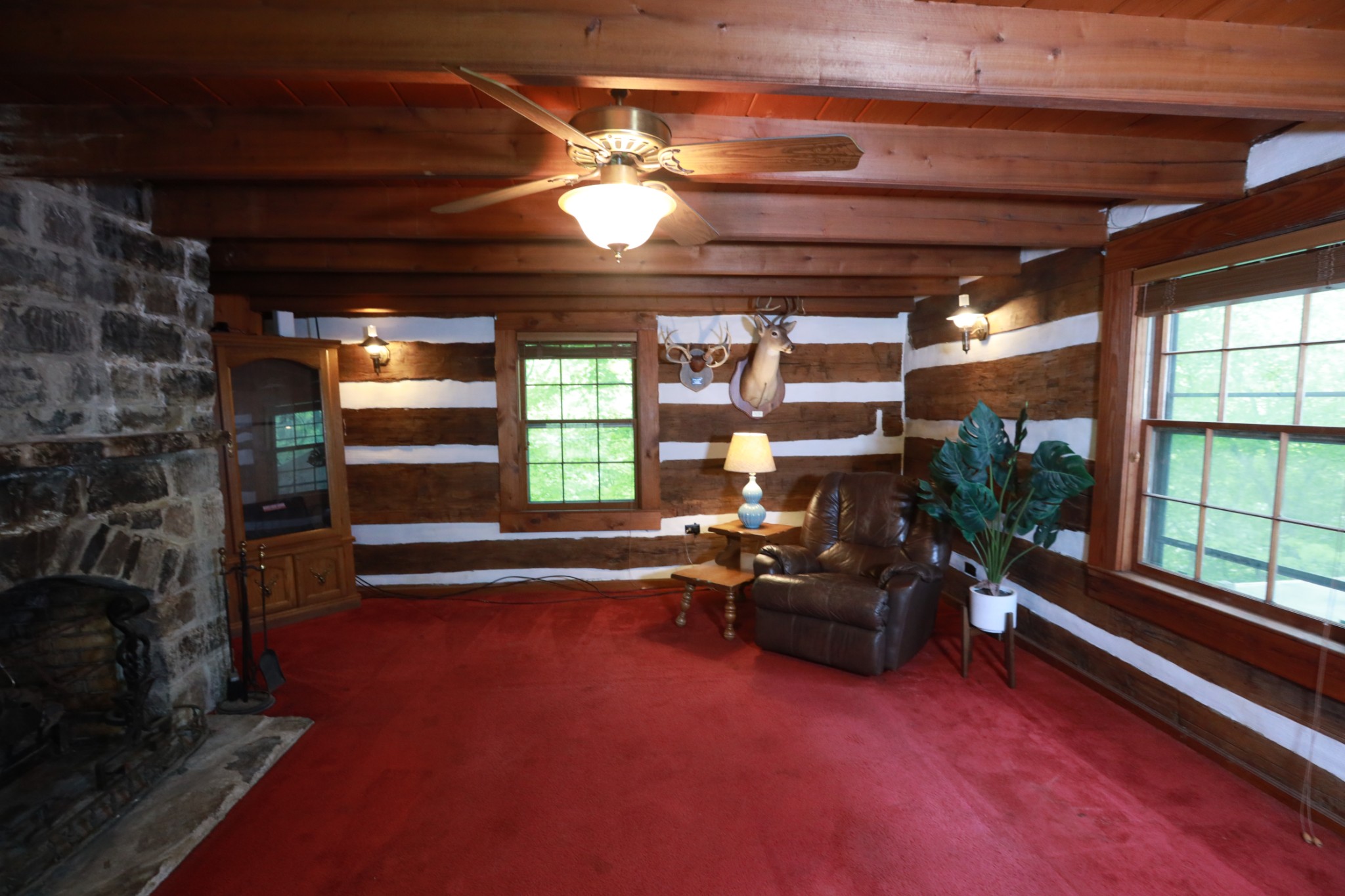 2634 Distillery Road Greenbrier, TN 37073 - Photo 9 of 35 a living room with furniture gym equipment and a large window