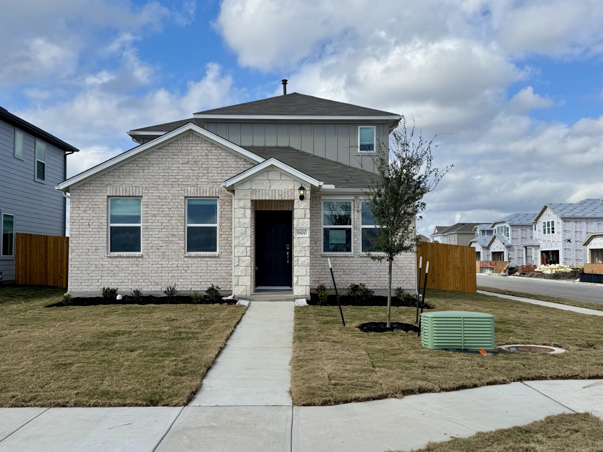 5800 Swedish Farms Terrace Del Valle, TX 78617 - Photo 1 of 1 a front view of a house with a yard