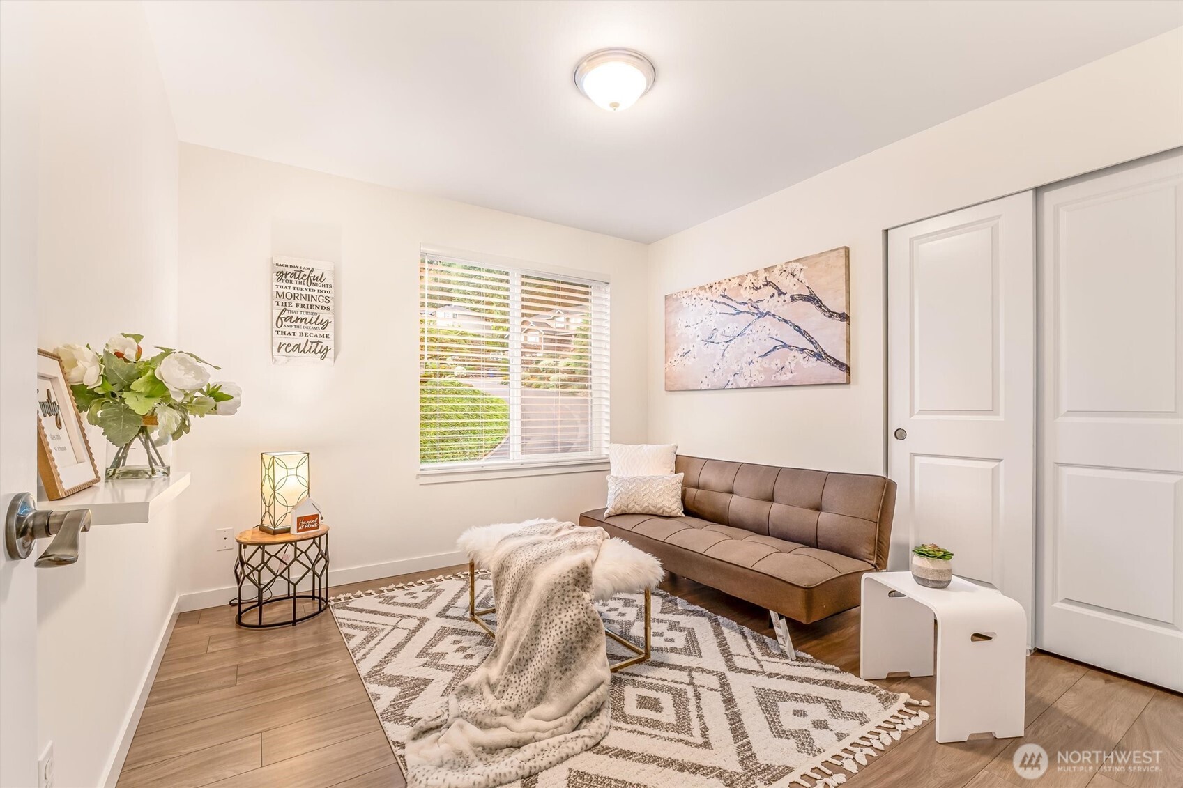 9213 Odin Way Bothell, WA 98011 - Photo 29 of 40 a living room with furniture and a large window